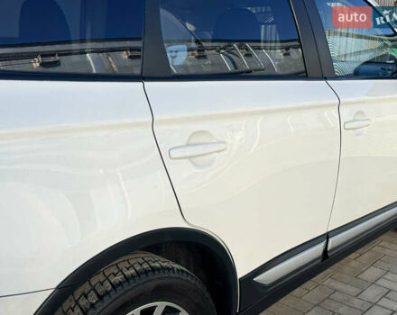 Білий Міцубісі Аутлендер, об'ємом двигуна 2.4 л та пробігом 178 тис. км за 12750 $, фото 32 на Automoto.ua