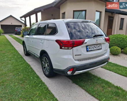 Белый Мицубиси Аутлендер, объемом двигателя 2.4 л и пробегом 145 тыс. км за 14900 $, фото 2 на Automoto.ua