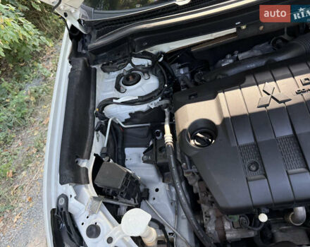 Белый Мицубиси Аутлендер, объемом двигателя 2.2 л и пробегом 240 тыс. км за 17999 $, фото 45 на Automoto.ua