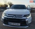 Белый Мицубиси Аутлендер, объемом двигателя 2.4 л и пробегом 148 тыс. км за 14700 $, фото 1 на Automoto.ua