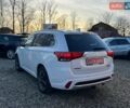 Білий Міцубісі Аутлендер, об'ємом двигуна 2 л та пробігом 236 тис. км за 17750 $, фото 14 на Automoto.ua