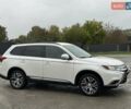 Белый Мицубиси Аутлендер, объемом двигателя 2.36 л и пробегом 225 тыс. км за 14650 $, фото 4 на Automoto.ua
