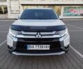 Белый Мицубиси Аутлендер, объемом двигателя 2.36 л и пробегом 147 тыс. км за 13800 $, фото 1 на Automoto.ua