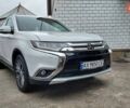 Белый Мицубиси Аутлендер, объемом двигателя 2.35 л и пробегом 127 тыс. км за 19000 $, фото 2 на Automoto.ua