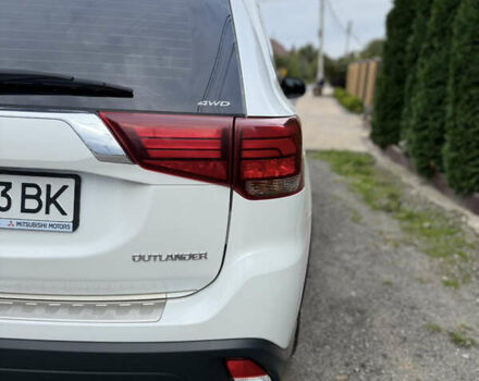 Белый Мицубиси Аутлендер, объемом двигателя 2.36 л и пробегом 134 тыс. км за 18500 $, фото 24 на Automoto.ua