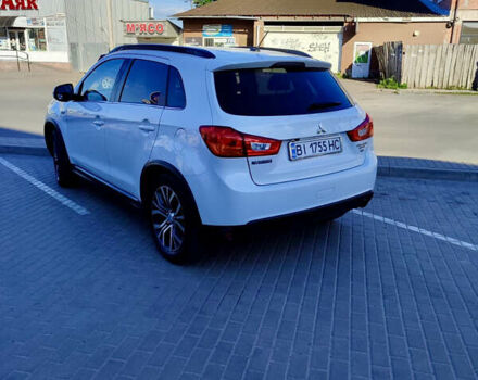 Білий Міцубісі Аутлендер, об'ємом двигуна 2.36 л та пробігом 133 тис. км за 13900 $, фото 4 на Automoto.ua