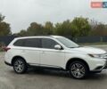 Белый Мицубиси Аутлендер, объемом двигателя 2.36 л и пробегом 225 тыс. км за 14650 $, фото 3 на Automoto.ua