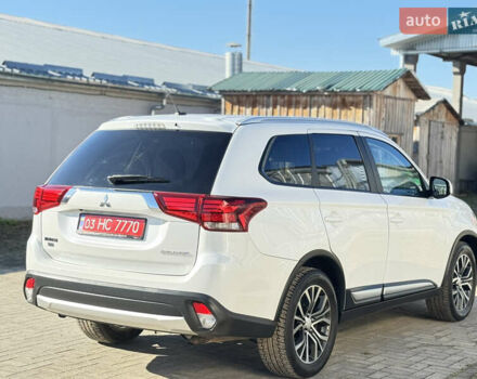 Білий Міцубісі Аутлендер, об'ємом двигуна 2.4 л та пробігом 178 тис. км за 12750 $, фото 9 на Automoto.ua