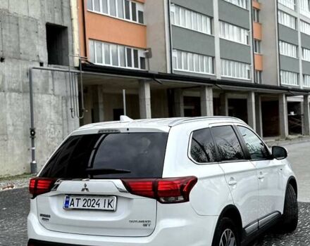 Білий Міцубісі Аутлендер, об'ємом двигуна 3 л та пробігом 198 тис. км за 17500 $, фото 5 на Automoto.ua