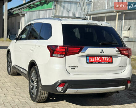 Білий Міцубісі Аутлендер, об'ємом двигуна 2.4 л та пробігом 178 тис. км за 12750 $, фото 7 на Automoto.ua