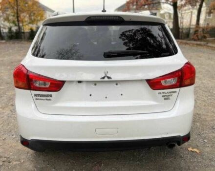 Білий Міцубісі Аутлендер, об'ємом двигуна 2.4 л та пробігом 98 тис. км за 4700 $, фото 8 на Automoto.ua
