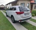 Белый Мицубиси Аутлендер, объемом двигателя 2.36 л и пробегом 144 тыс. км за 15499 $, фото 1 на Automoto.ua