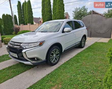 Белый Мицубиси Аутлендер, объемом двигателя 2.4 л и пробегом 145 тыс. км за 14900 $, фото 4 на Automoto.ua