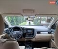 Белый Мицубиси Аутлендер, объемом двигателя 2.36 л и пробегом 144 тыс. км за 15499 $, фото 13 на Automoto.ua