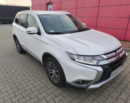 Белый Мицубиси Аутлендер, объемом двигателя 2 л и пробегом 135 тыс. км за 10200 $, фото 1 на Automoto.ua