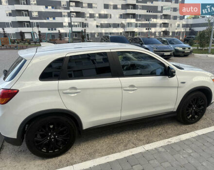 Белый Мицубиси Аутлендер, объемом двигателя 2 л и пробегом 133 тыс. км за 13000 $, фото 15 на Automoto.ua