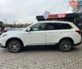 Белый Мицубиси Аутлендер, объемом двигателя 2.36 л и пробегом 153 тыс. км за 15700 $, фото 4 на Automoto.ua