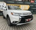 Белый Мицубиси Аутлендер, объемом двигателя 2.36 л и пробегом 153 тыс. км за 15700 $, фото 1 на Automoto.ua