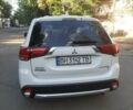 Белый Мицубиси Аутлендер, объемом двигателя 2.36 л и пробегом 90 тыс. км за 15500 $, фото 4 на Automoto.ua