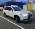 Белый Мицубиси Аутлендер, объемом двигателя 3 л и пробегом 148 тыс. км за 18500 $, фото 4 на Automoto.ua