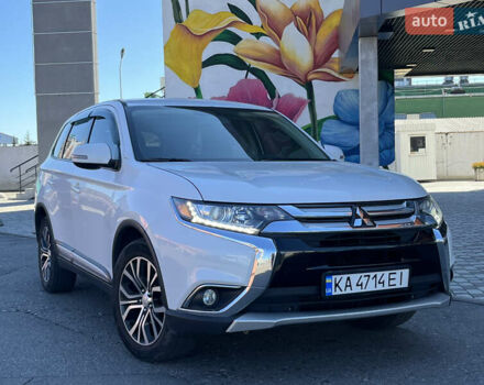 Белый Мицубиси Аутлендер, объемом двигателя 2.4 л и пробегом 210 тыс. км за 13550 $, фото 2 на Automoto.ua