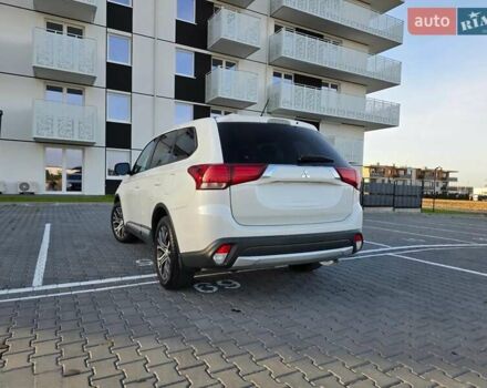 Белый Мицубиси Аутлендер, объемом двигателя 2.36 л и пробегом 230 тыс. км за 15900 $, фото 5 на Automoto.ua