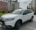 Белый Мицубиси Аутлендер, объемом двигателя 2.4 л и пробегом 175 тыс. км за 16999 $, фото 1 на Automoto.ua