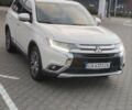 Білий Міцубісі Аутлендер, об'ємом двигуна 2.36 л та пробігом 118 тис. км за 17800 $, фото 1 на Automoto.ua