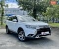 Белый Мицубиси Аутлендер, объемом двигателя 2.36 л и пробегом 147 тыс. км за 15990 $, фото 1 на Automoto.ua