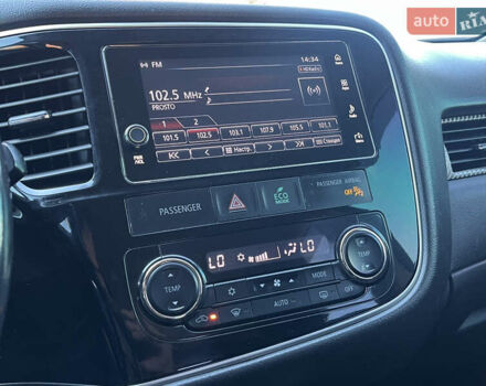 Белый Мицубиси Аутлендер, объемом двигателя 2.4 л и пробегом 210 тыс. км за 13550 $, фото 7 на Automoto.ua