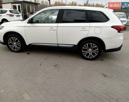 Белый Мицубиси Аутлендер, объемом двигателя 2.4 л и пробегом 225 тыс. км за 10999 $, фото 5 на Automoto.ua