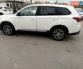Белый Мицубиси Аутлендер, объемом двигателя 2.4 л и пробегом 225 тыс. км за 10999 $, фото 5 на Automoto.ua