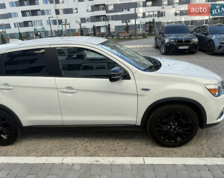 Белый Мицубиси Аутлендер, объемом двигателя 2 л и пробегом 133 тыс. км за 13000 $, фото 16 на Automoto.ua