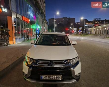 Белый Мицубиси Аутлендер, объемом двигателя 2.36 л и пробегом 149 тыс. км за 15800 $, фото 2 на Automoto.ua