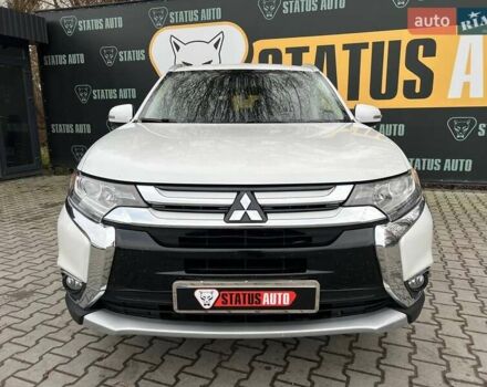 Белый Мицубиси Аутлендер, объемом двигателя 2.36 л и пробегом 153 тыс. км за 15700 $, фото 1 на Automoto.ua