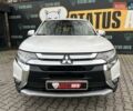 Белый Мицубиси Аутлендер, объемом двигателя 2.36 л и пробегом 153 тыс. км за 15700 $, фото 1 на Automoto.ua