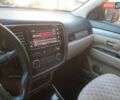 Белый Мицубиси Аутлендер, объемом двигателя 2.36 л и пробегом 90 тыс. км за 15500 $, фото 8 на Automoto.ua
