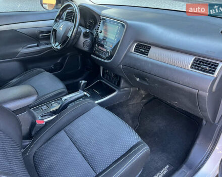 Белый Мицубиси Аутлендер, объемом двигателя 2.4 л и пробегом 210 тыс. км за 13550 $, фото 13 на Automoto.ua