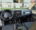 Белый Мицубиси Аутлендер, объемом двигателя 2.36 л и пробегом 230 тыс. км за 15900 $, фото 9 на Automoto.ua