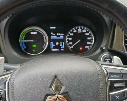 Белый Мицубиси Аутлендер, объемом двигателя 2 л и пробегом 127 тыс. км за 20000 $, фото 1 на Automoto.ua