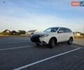 Белый Мицубиси Аутлендер, объемом двигателя 2.36 л и пробегом 230 тыс. км за 15900 $, фото 1 на Automoto.ua
