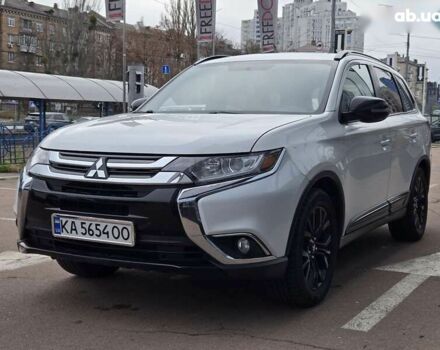 Белый Мицубиси Аутлендер, объемом двигателя 2.4 л и пробегом 115 тыс. км за 19300 $, фото 1 на Automoto.ua
