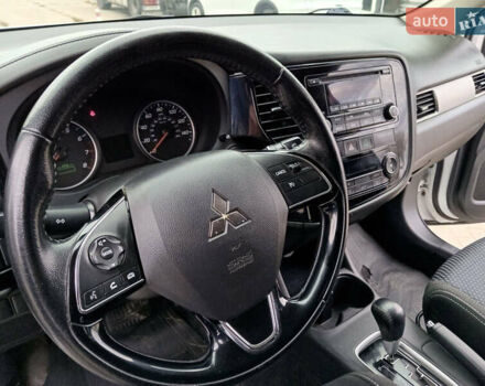 Белый Мицубиси Аутлендер, объемом двигателя 2.4 л и пробегом 225 тыс. км за 10999 $, фото 13 на Automoto.ua