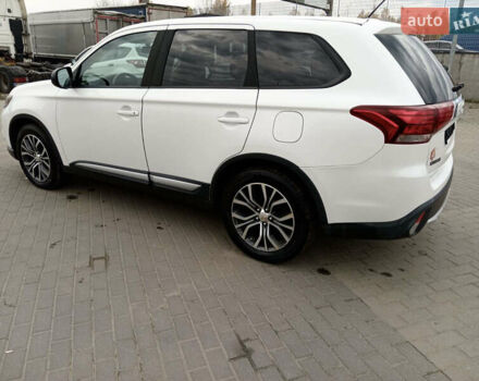 Белый Мицубиси Аутлендер, объемом двигателя 2.4 л и пробегом 225 тыс. км за 10999 $, фото 9 на Automoto.ua