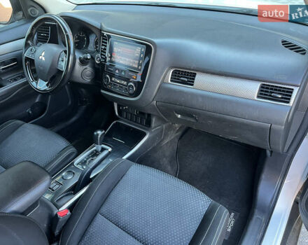 Белый Мицубиси Аутлендер, объемом двигателя 2.4 л и пробегом 210 тыс. км за 13550 $, фото 12 на Automoto.ua