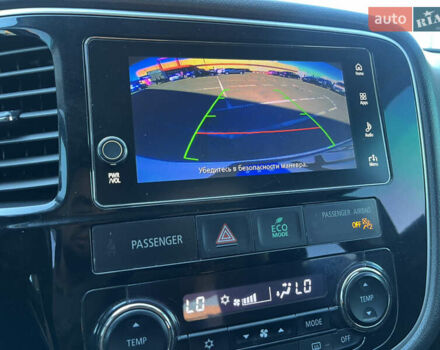 Белый Мицубиси Аутлендер, объемом двигателя 2.4 л и пробегом 210 тыс. км за 13550 $, фото 14 на Automoto.ua
