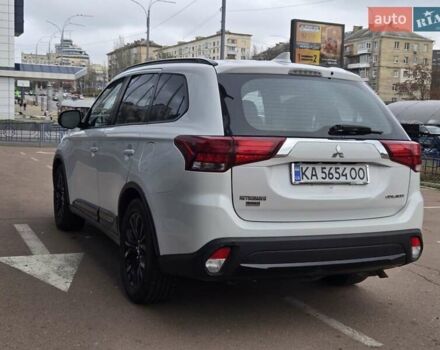 Белый Мицубиси Аутлендер, объемом двигателя 2.4 л и пробегом 115 тыс. км за 19300 $, фото 4 на Automoto.ua
