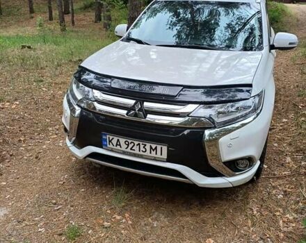 Белый Мицубиси Аутлендер, объемом двигателя 2 л и пробегом 127 тыс. км за 20000 $, фото 17 на Automoto.ua