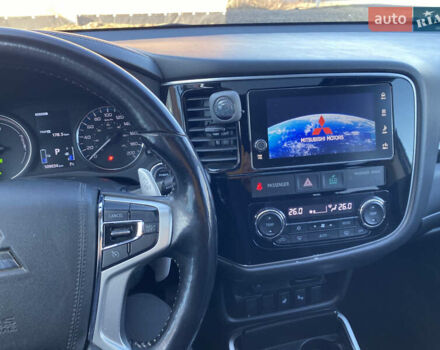 Белый Мицубиси Аутлендер, объемом двигателя 2 л и пробегом 109 тыс. км за 16999 $, фото 1 на Automoto.ua