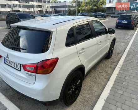 Белый Мицубиси Аутлендер, объемом двигателя 2 л и пробегом 133 тыс. км за 13000 $, фото 14 на Automoto.ua